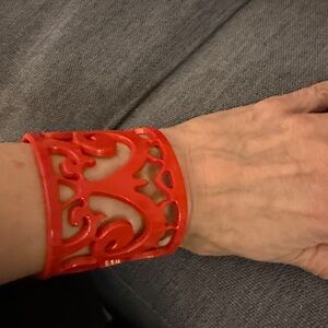 Belissimo Filagree Wide Cuff Bracelet Made of Bright Red Plastic.
